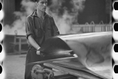 3114_ Steelworker with rolled steel plate ,  Pittsburgh, Pennsylvania