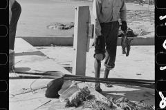 3204_Black American fisherman with his catch , Key West, Florida