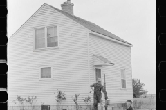 3289_ Part time farmer with his son , Wabash Farms , Indiana.