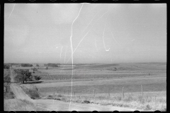 3384_Country road  through grazing land, Dawson County, Nebraska     (spoiled negative )