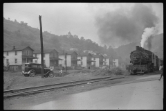 3603_Train laden with  coal passes  miners' homes, Osage , West Virginia