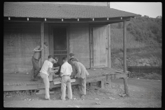 3609_Miners gambling  outside the  Company Store, Chaplin