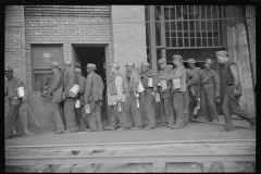 3833_Miners handing in lamps ,. Caples, West Virginia