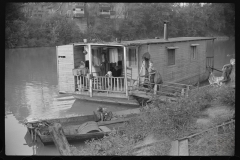 3847_ Family living on riverboat, Charleston, West Virginia.