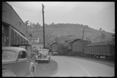 3880_Train hauling  coal through centre of  Osage, West Virginia