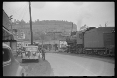 3881_Train hauling  coal through centre of  Osage, West Virginia