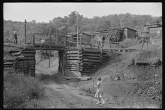 3887_Coal miner's children playing on the  track