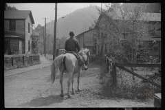 3913_Miner taking home provisions, Caples, West Virginia