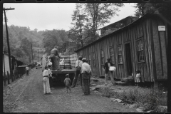 4004_Relief truck brings food  to abandoned mining town