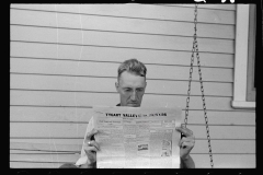4203_Tygart Valley homesteader reading Newspaper