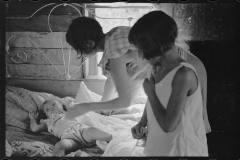 0008_Wife of sharecropper with  sick child
