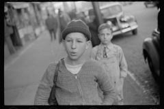 0507_ Street scene, possible boy who sells papers, Omaha