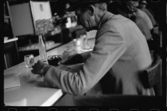 0520_Possibly FSA official at a diner , unknown location