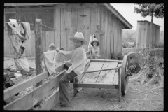 0565_ Child suffering from  rickets and malnutrition, Wilson cotton plantation,  Arkansas