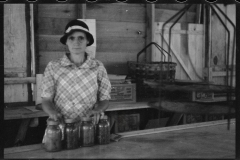 0607_Woman with Kilner jars, unknown location