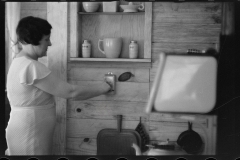 0623_Hosewife in modern kitchen , unknown location