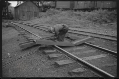 0745_Track worker cutting a steel section with a welding torch , unknown location