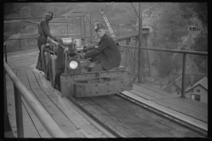 0751_Mine train with two miners , Maidsville, West Virginia