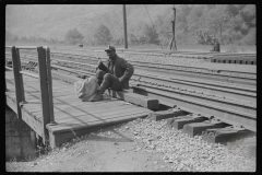 0831_Miner taking  a rest on his way home,