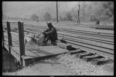 0832_Miner taking  a rest on his way home,