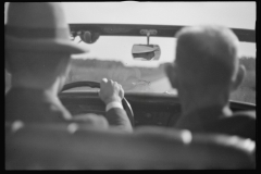0940_Driving in open top car , unknown location .
