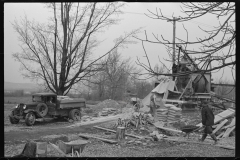 1190_1190_Unloaded bags of cement for bridge building . Location unknown