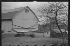 1225_Large new barn with harrow behind , unknown location