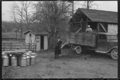 1232_truck in yard of probable dairy farm ( churns) , unknown owner and location