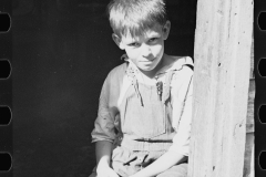 1249_ Young boy , agricultural style dress , unknown location