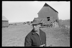 01569_Farmer contemplating his business , probably Seward County