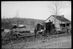 1628_Horse alongside long wheeled contraption  , Tennessee