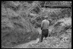 1728_Essential work , clearing ditches , watercourse, unknown location