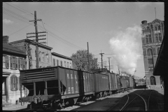 1915_Freight train alongside The brew House , Hagerstown , Maryland