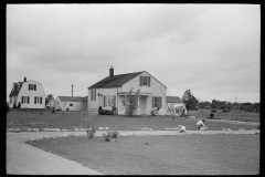 1987_Mother and child close by their new build property ,  Scioto Farms, Ohio