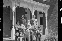 1993_Large happy well dressed family in front of their house , Scioto farms, Ohio