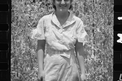 2090_Rehabilitation client with basket of English peas, farm near Batesville