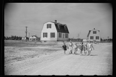 2101_Children coming home from school  Decatur Homesteads