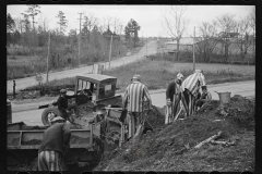 2166_Convicts working on state road, North Carolina