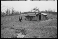 2461_Resettlement Administration representative outside client's  house/shack , Jackson County