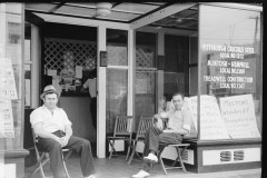 3133_Steelworker sitting in front of union office, Midland, Pennsylvania .Steel Workers Organising Committee