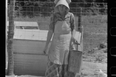 3248_Farmer's wife feeding the chickens , Scioto Farms, Ohio