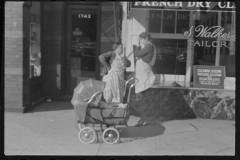 3518_Dry Cleaners , Women with baby carriage, L Street, Washington, D.C.