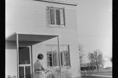 3801_Woman with hosepipe ,  Greenbelt, Maryland