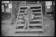 3836_Coal miner waiting for lift home. Caples, West Virginia