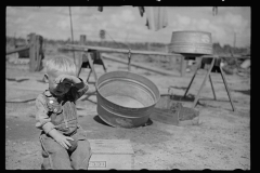 3870_ Child at the Foster farm unit. Irwinville Farms, Georgia