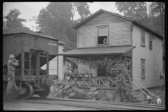 3879_Train hauling  coal through centre of  Osage, West Virginia