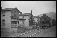 3882_Train hauling  coal through centre of  Osage, West Virginia