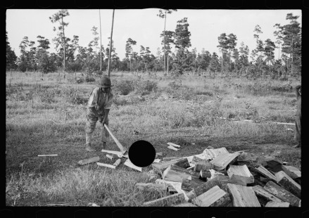 0057_African -American boy chopping wood