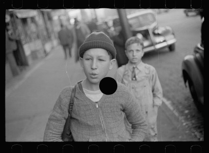 0507_ Street scene, possible boy who sells newspapers, Omaha