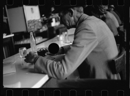 0520_Possibly FSA official at a diner , unknown location